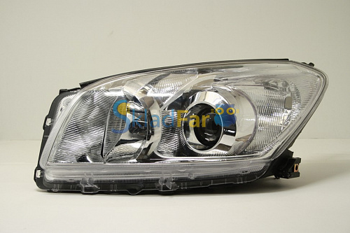 Фара левая TOYOTA RAV 4 09- (212-11N7) с корректором длинная база  
