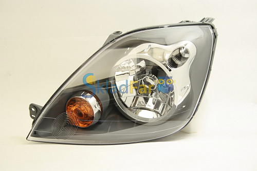 Фара левая FORD FIESTA 06-07 с коррек  