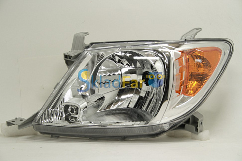 Фара левая TOYOTA HILUX 04-07  под коррек ЖЕЛТ поворот